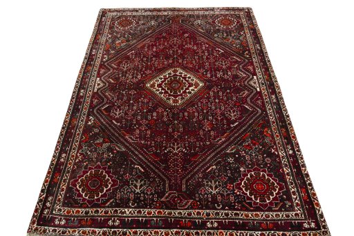 Surface texture of 2000s Shiraz rug with natural Wool and intricate pattern