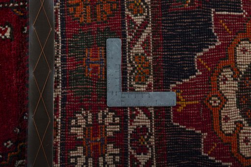 Surface texture of 2000s Shiraz rug with natural Wool and intricate pattern