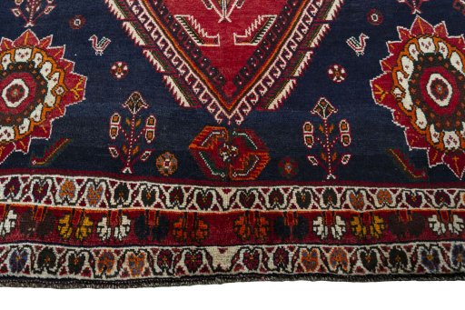 Close-up detail of 2000s Shiraz rug from Iran / Persia showing Wool weave