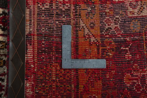 Surface texture of 2000s Shiraz rug with natural Wool and intricate pattern