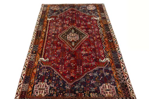 Surface texture of 2000s Shiraz rug with natural Wool and intricate pattern