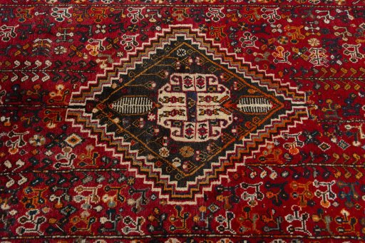 Central medallion detail of 2000s Shiraz rug from Iran / Persia