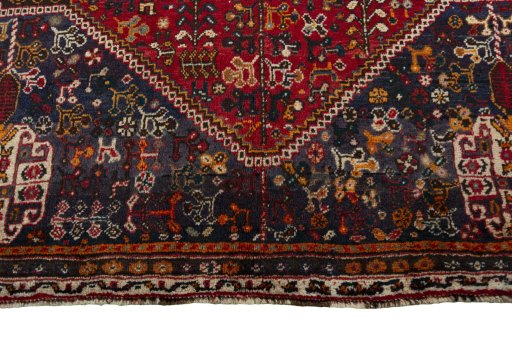Close-up detail of 2000s Shiraz rug from Iran / Persia showing Wool weave