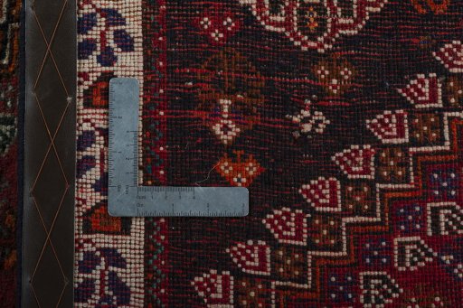 Close-up detail of 2000s Shiraz rug from Iran / Persia showing Wool weave