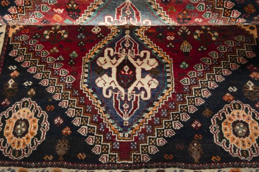 Full view of 2000s Shiraz rug from Iran / Persia, 158 × 118 cm in Red tones