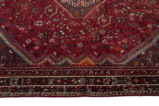 Corner detail of 1970s Shiraz rug showing border pattern and Wool pile