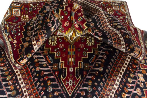 Close-up detail of 2000s Shiraz rug from Iran / Persia showing Wool weave