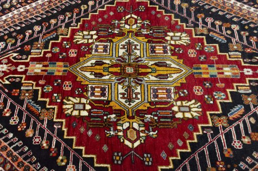 Central medallion detail of 2000s Shiraz rug from Iran / Persia