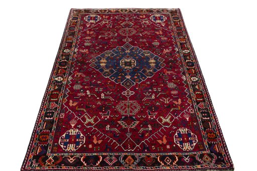Surface texture of 2000s Shiraz rug with natural Wool and intricate pattern