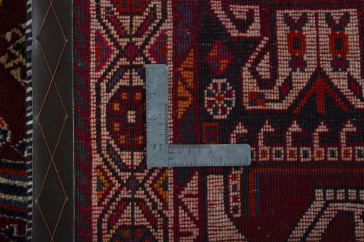 Surface texture of 2000s Shiraz rug with natural Wool and intricate pattern