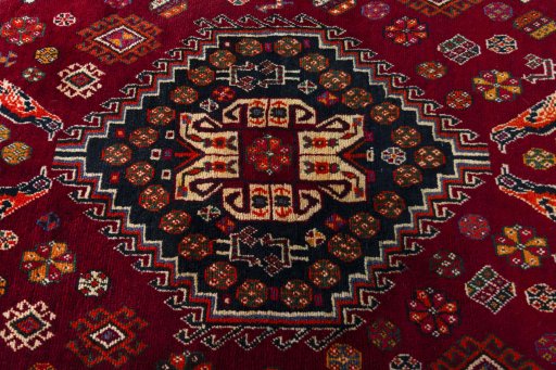 Central medallion detail of 2000s Shiraz rug from Iran / Persia