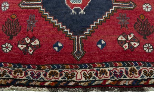 Central medallion detail of 2000s Shiraz rug from Iran / Persia