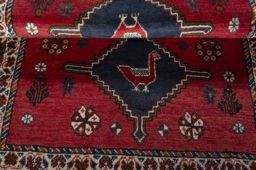 Full view of 2000s Shiraz rug from Iran / Persia, 152 × 101 cm in Red tones