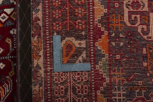 Surface texture of 2000s Shiraz rug with natural Wool and intricate pattern