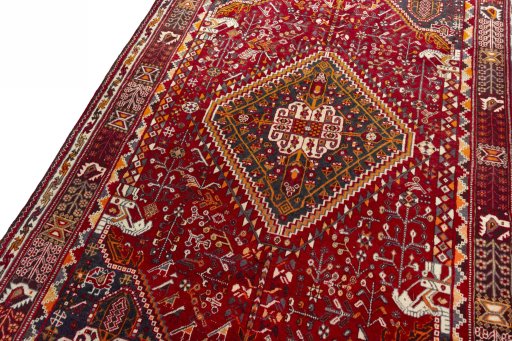 Backside of handmade 2000s Shiraz rug showing knot structure and weave density