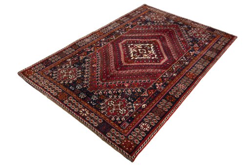 Corner detail of 2000s Shiraz rug showing border pattern and Wool pile