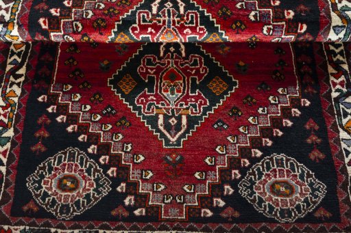 Full view of 2000s Shiraz rug from Iran / Persia, 170 × 117 cm in Red tones