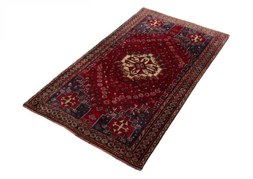 Corner detail of 2000s Shiraz rug showing border pattern and Wool pile