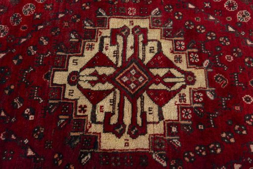Central medallion detail of 2000s Shiraz rug from Iran / Persia