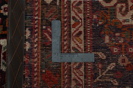 Surface texture of 2000s Shiraz rug with natural Wool and intricate pattern