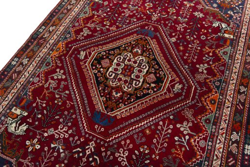 Backside of handmade 2000s Shiraz rug showing knot structure and weave density