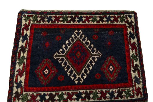Surface texture of 2000s Shiraz rug with natural Wool and intricate pattern