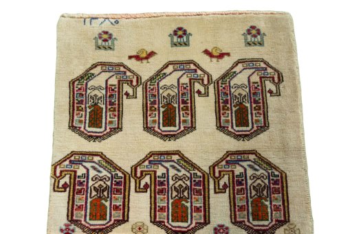 Surface texture of 2000s Shiraz rug with natural Wool and intricate pattern