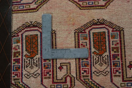 Backside of handmade 2000s Shiraz rug showing knot structure and weave density