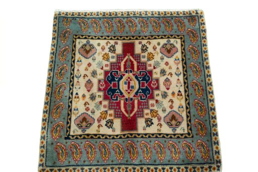 Surface texture of 2000s Shiraz rug with natural Wool and intricate pattern