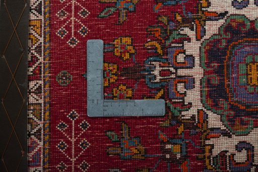 Backside of handmade 2000s Shiraz rug showing knot structure and weave density