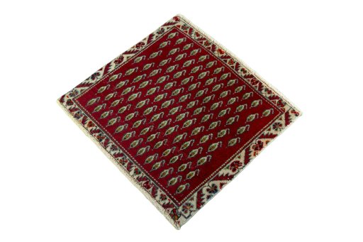 Corner detail of 2000s Shiraz rug showing border pattern and Wool pile