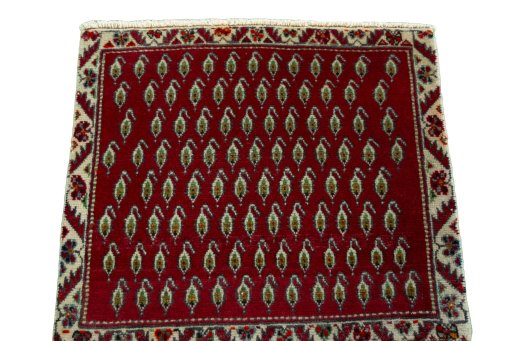 Surface texture of 2000s Shiraz rug with natural Wool and intricate pattern