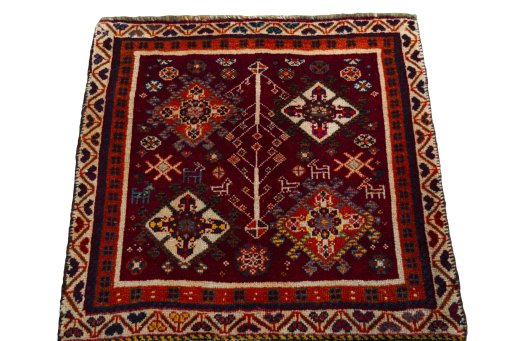 Surface texture of 2000s Shiraz rug with natural Wool and intricate pattern