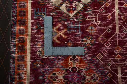 Backside of handmade 2000s Shiraz rug showing knot structure and weave density