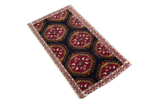 Corner detail of 2000s Shiraz rug showing border pattern and Wool pile