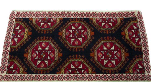 Surface texture of 2000s Shiraz rug with natural Wool and intricate pattern