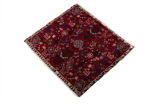 Corner detail of 2000s Shiraz rug showing border pattern and Wool pile