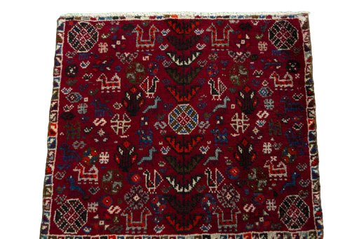Surface texture of 2000s Shiraz rug with natural Wool and intricate pattern