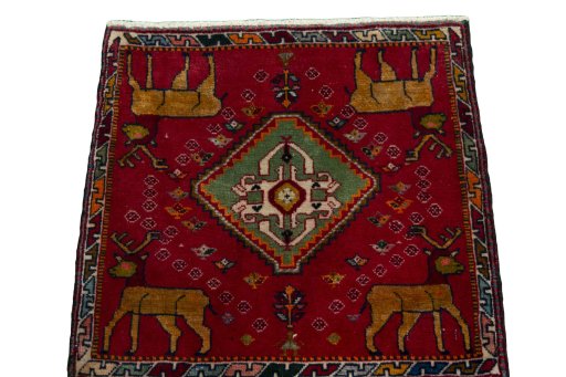 Surface texture of 2000s Shiraz rug with natural Wool and intricate pattern