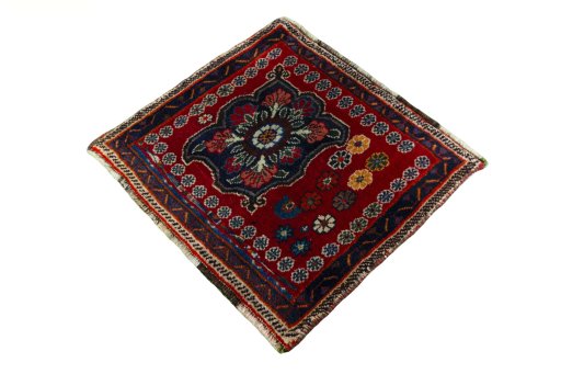 Corner detail of 2000s Shiraz rug showing border pattern and Wool pile