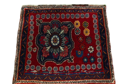 Surface texture of 2000s Shiraz rug with natural Wool and intricate pattern