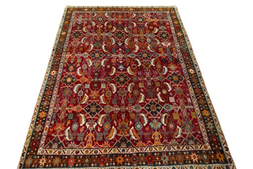 Surface texture of 2000s Shiraz rug with natural Wool and intricate pattern