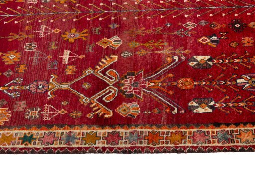 Corner detail of 2000s Shiraz rug showing border pattern and Wool pile