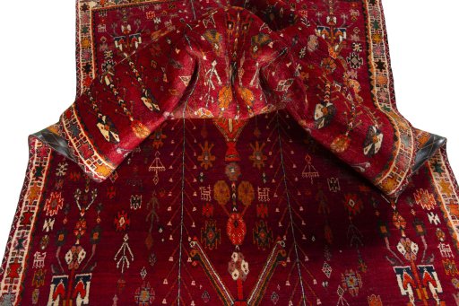 Surface texture of 2000s Shiraz rug with natural Wool and intricate pattern