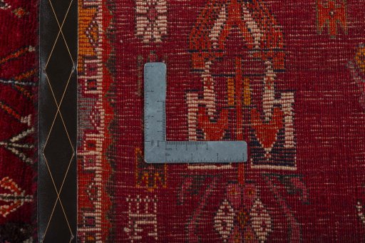 Backside of handmade 2000s Shiraz rug showing knot structure and weave density