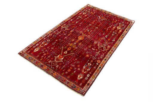 Corner detail of 2000s Shiraz rug showing border pattern and Wool pile