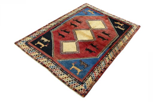 Corner detail of 2000s Shiraz rug showing border pattern and Wool pile