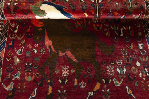 Full view of 2000s Shiraz rug from Iran / Persia, 190 × 118 cm in Red tones