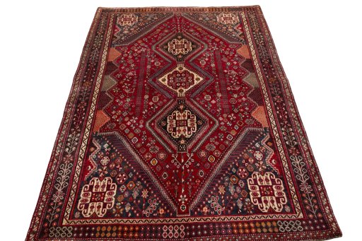 Surface texture of 2000s Shiraz rug with natural Wool and intricate pattern