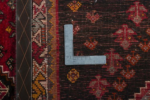 Close-up detail of 2000s Shiraz rug from Iran / Persia showing Wool weave
